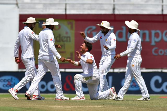 Yasir Shah (C) of Pakistan celebrates with teammates after he dismissed Sri Lanka's Lakshan Sandakan during the fifth day of the first Test cricket match between Sri Lanka and Pakistan at Sheikh Zayed Stadium in Abu Dhabi on October 2, 2017. (AFP) Yasir Shah (C) of Pakistan celebrates with teammates after he dismissed Sri Lanka's Lakshan Sandakan during the fifth day of the first Test cricket match between Sri Lanka and Pakistan at Sheikh Zayed Stadium in Abu Dhabi on October 2, 2017. (AFP)