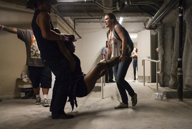 People assist a wounded woman at the Tropicana during an active shooter situation on the Las Vegas Stirp in Las Vegas Sunday, Oct. 1, 2017. (AP) People assist a wounded woman at the Tropicana during an active shooter situation on the Las Vegas Stirp in Las Vegas Sunday, Oct. 1, 2017. (AP)