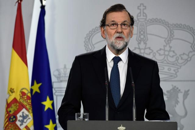 Spanish Prime Minister Mariano Rajoy speaks during a press conference at La Moncloa palace in Madrid on October 1, 2017. (AFP)