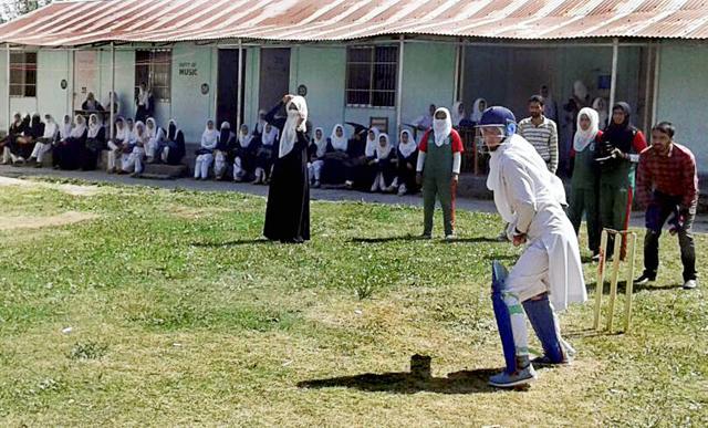 Nothing stops them. Women cricketers in burqa and hijjab at Baramulla defying social restrictions in their passion for the sport. (PTI) Nothing stops them. Women cricketers in burqa and hijjab at Baramulla defying social restrictions in their passion for the sport. (PTI)