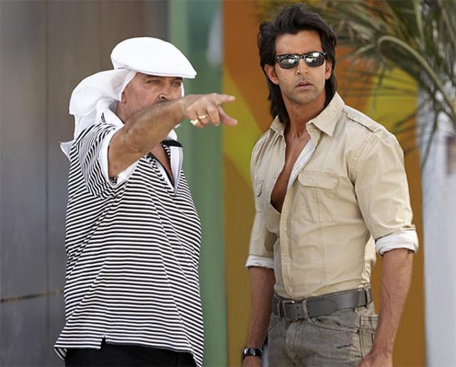 Filmmaker Rakesh Roshan with son, actor Hrithik Roshan on the set of Koi Mil Gaya. Filmmaker Rakesh Roshan with son, actor Hrithik Roshan on the set of Koi Mil Gaya.