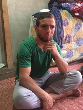 Danish Rajab Jhat, 24, has almost lost his vision when he was hit by pellets in both eyes last year. The family has spent a large chunk of their savings — around Rs 4 lakh — on his surgeries. (Neelam Pandey/HT Photo)