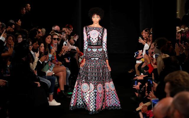 A model presents a creation by Indian designer Manish Arora as part of his Spring/Summer 2018 women's ready-to-wear collection show. (Reuters/Gonzalo Fuentes) A model presents a creation by Indian designer Manish Arora as part of his Spring/Summer 2018 women's ready-to-wear collection show. (Reuters/Gonzalo Fuentes)