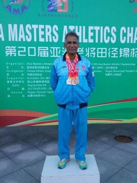 Master athlete Shivnath with his bronze medals. (HT Photo) Master athlete Shivnath with his bronze medals. (HT Photo)
