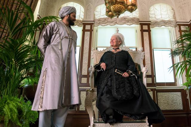 In this image released by Focus Features, Judi Dench, right, and Ali Fazal appear in a scene from Victoria and Abdul. (AP)