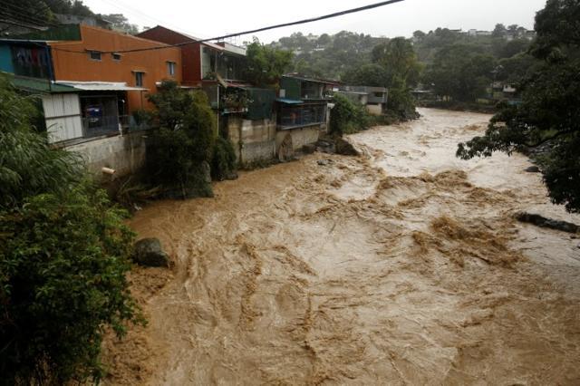 The flooded Tiribi river is seen during heavy rains of Tropical Storm Nate that affects the country in San Jose, Costa Rica October 5, 2017. (Reuters)