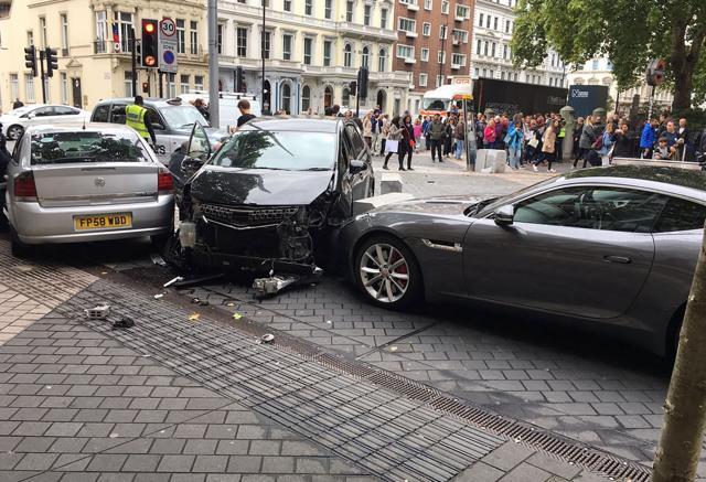 A handout picture obtained from the twitter user @StefanoSutter shows damaged vehicles on Exhibition Road after a vehicle apparently drove into pedestrians, injuring a number of people. (AFP Photo) A handout picture obtained from the twitter user @StefanoSutter shows damaged vehicles on Exhibition Road after a vehicle apparently drove into pedestrians, injuring a number of people. (AFP Photo)