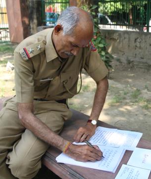 Syamalan practises calligraphy as and when he gets time. (Shivam Saxena/HT Photo)