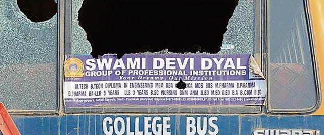 Windowpanes of a bus vandalised at Swami Devi Dyal College, Barwala, in Panchkula district. (Sant Arora/HT) Windowpanes of a bus vandalised at Swami Devi Dyal College, Barwala, in Panchkula district. (Sant Arora/HT)