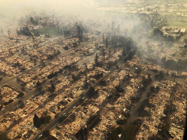 This aerial photo provided by the California Highway Patrol shows some of hundreds of homes destroyed in a wildfire that swept through Santa Rosa. (AP) This aerial photo provided by the California Highway Patrol shows some of hundreds of homes destroyed in a wildfire that swept through Santa Rosa. (AP)