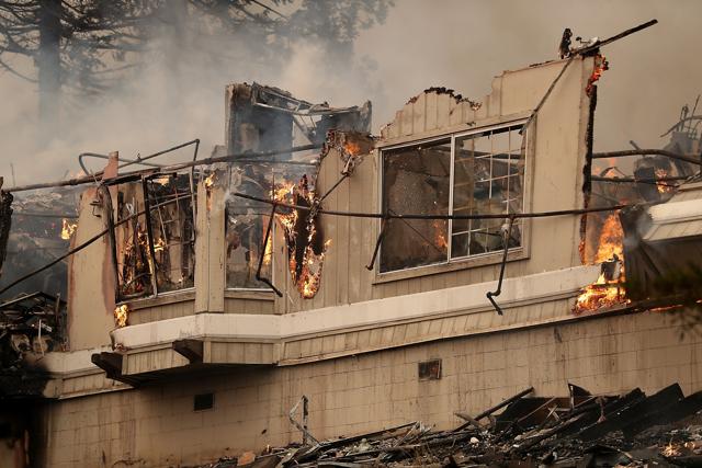 Flames destroyed many houses in Santa Rosa, California. Ten people have died in wildfires. (AFP) Flames destroyed many houses in Santa Rosa, California. Ten people have died in wildfires. (AFP)