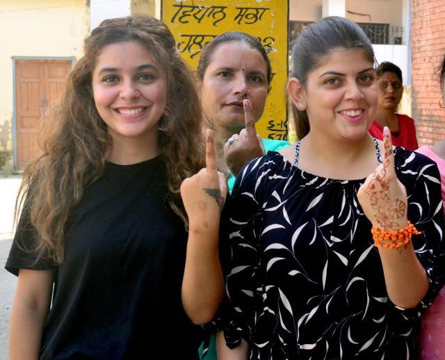 Voters shows their marked fingers after casting their votes at Pathankot for the Gurdaspur Lok Sabha bypoll on Wednesday, October 11. (Sameer Sehgal/HT) Voters shows their marked fingers after casting their votes at Pathankot for the Gurdaspur Lok Sabha bypoll on Wednesday, October 11. (Sameer Sehgal/HT)