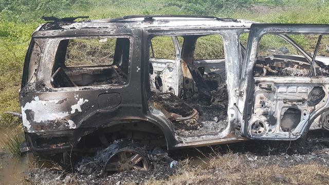The car was set on fire by villagers after it killed 2 girls in an accident. (HT PHOTO)