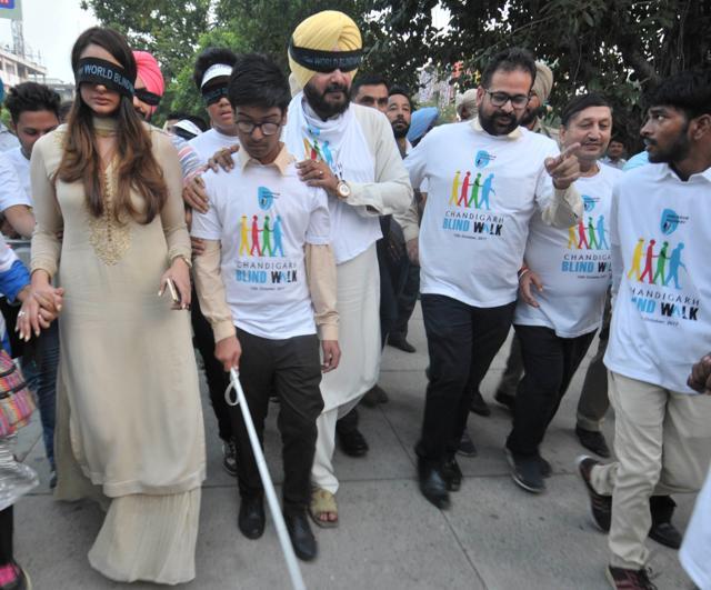 Actor Japji Khaira and Punjab minister Navjot Sidhu during the Blind Walk in Chandigarh. (Ravi Kumar/HT) Actor Japji Khaira and Punjab minister Navjot Sidhu during the Blind Walk in Chandigarh. (Ravi Kumar/HT)