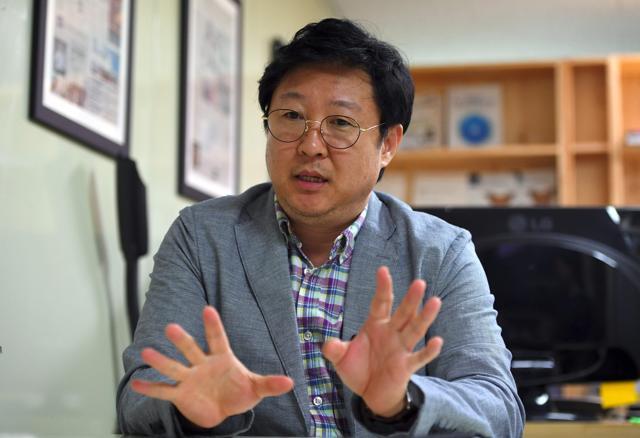 Kim Ho-Jin, CEO of Santa Cruise "digital laundry" company, speaking during an interview with AFP at his office in Seoul. (AFP) Kim Ho-Jin, CEO of Santa Cruise "digital laundry" company, speaking during an interview with AFP at his office in Seoul. (AFP)