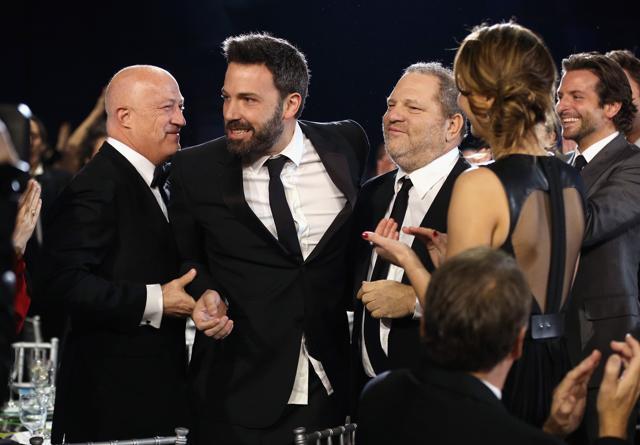 (FILES) This file photo taken on January 10, 2013 shows (L-R) Co-Chairman of Creative Artists Agency Bryan Lourd, director Ben Affleck and co-chairmen of The Weinstein Company Harvey Weinstein attending the 18th Annual Critics' Choice Movie Awards held at Barker Hangar in Santa Monica, California. (AFP) (FILES) This file photo taken on January 10, 2013 shows (L-R) Co-Chairman of Creative Artists Agency Bryan Lourd, director Ben Affleck and co-chairmen of The Weinstein Company Harvey Weinstein attending the 18th Annual Critics' Choice Movie Awards held at Barker Hangar in Santa Monica, California. (AFP)