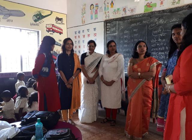 Khare at the school with volunteers (HT Photo) Khare at the school with volunteers (HT Photo)