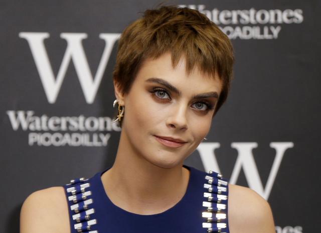 Delevingne said in an Instagram post on Oct. 11, that she reluctantly met Harvey Weinstein in a hotel room and discovered another woman was there. He asked them to kiss. (AP)