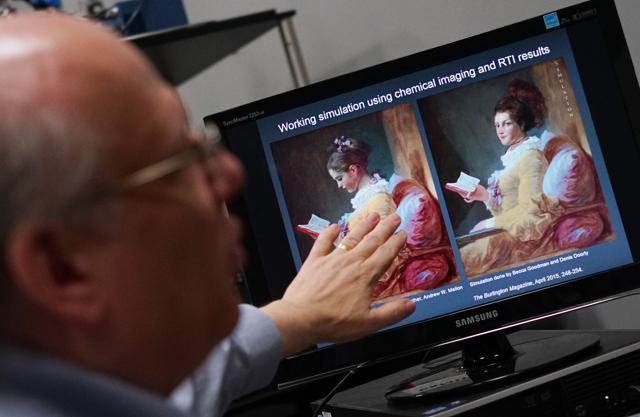 National Gallery of Art senior imaging scientist John K. Delaney showing images of Young Girl Reading by Jean-Honoré Fragonard at the National Gallery of Art in Washington, DC. (AFP) National Gallery of Art senior imaging scientist John K. Delaney showing images of Young Girl Reading by Jean-Honoré Fragonard at the National Gallery of Art in Washington, DC. (AFP)