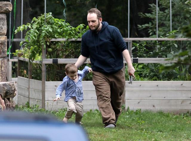 Freed Canadian hostage Joshua Boyle and one of his children walk outside the Boyle's family home in Smiths Falls, Ontario, Canada (AFP Photo) Freed Canadian hostage Joshua Boyle and one of his children walk outside the Boyle's family home in Smiths Falls, Ontario, Canada (AFP Photo)