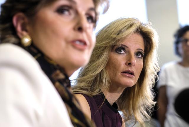 Summer Zervos, right, listens alongside her attorney Gloria Allred during a news conference in Los Angeles on October 14, 2016. (AP File Photo)