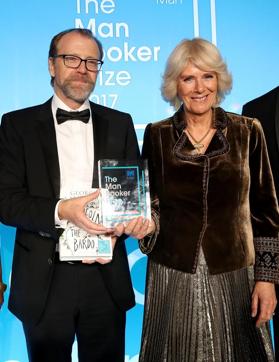Britain's Camilla, Duchess of Cornwall, presents US author George Saunders with the award for the 2017 Man Booker Prize for Fiction, at the Guildhall in central London on October 17. (AFP Photo) Britain's Camilla, Duchess of Cornwall, presents US author George Saunders with the award for the 2017 Man Booker Prize for Fiction, at the Guildhall in central London on October 17. (AFP Photo)
