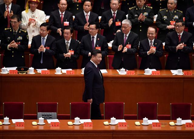 Chinese President Xi Jinping (C) attends the opening session of the 19th Communist Party Congress at the Great Hall of the People in Beijing on October 18, 2017. (AFP Photo) Chinese President Xi Jinping (C) attends the opening session of the 19th Communist Party Congress at the Great Hall of the People in Beijing on October 18, 2017. (AFP Photo)