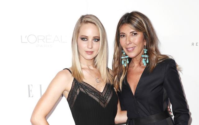 Jennifer Lawrence (L) and ELLE Editor-in-Chief Nina Garcia attend ELLE's 24th Annual Women in Hollywood Celebration. (AFP)