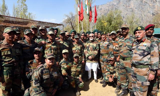 Prime Minister Narendra Modi and Indian Army chief Gen BS Rawat with jawans on the occasion of Diwali in Gurez Valley in Jammu and Kashmir on Thursday. (Photo: Narendra Modi Twitter) Prime Minister Narendra Modi and Indian Army chief Gen BS Rawat with jawans on the occasion of Diwali in Gurez Valley in Jammu and Kashmir on Thursday. (Photo: Narendra Modi Twitter)