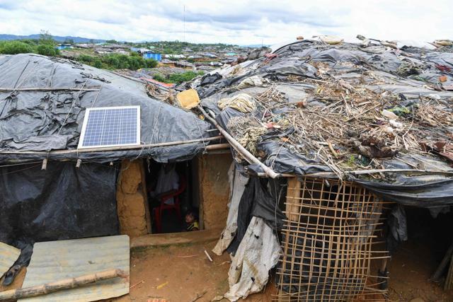 This photo taken on October 7, 2017 shows a solar panel on the roof of a temporary home for Rohingya refugees at the Kutupalong refugee camp in Cox's Bazar. (AFP) This photo taken on October 7, 2017 shows a solar panel on the roof of a temporary home for Rohingya refugees at the Kutupalong refugee camp in Cox's Bazar. (AFP)