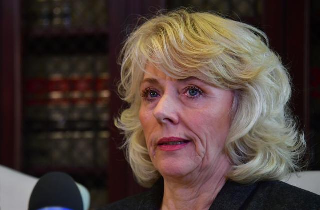 Former actress Heather Kerr, 56, speaks at a press conference with attorney Gloria Allred in Los Angeles, California on October 20, 2017, as she alleges she was sexually harassed by Harvey Weinstein. (AFP)