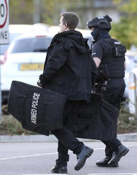 Police at the scene at Bermuda Park in Nuneaton, central England, where they are dealing with an ongoing incident, Sunday October 22, 2017. (AP Photo) Police at the scene at Bermuda Park in Nuneaton, central England, where they are dealing with an ongoing incident, Sunday October 22, 2017. (AP Photo)