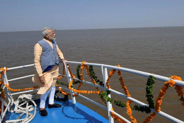 Prime Minister Narendra Modi on the maiden voyage of the Ro-Ro ferry service between Ghogha and Dahej in Bhavnagar, Gujarat on Sunday. (PTI) Prime Minister Narendra Modi on the maiden voyage of the Ro-Ro ferry service between Ghogha and Dahej in Bhavnagar, Gujarat on Sunday. (PTI)