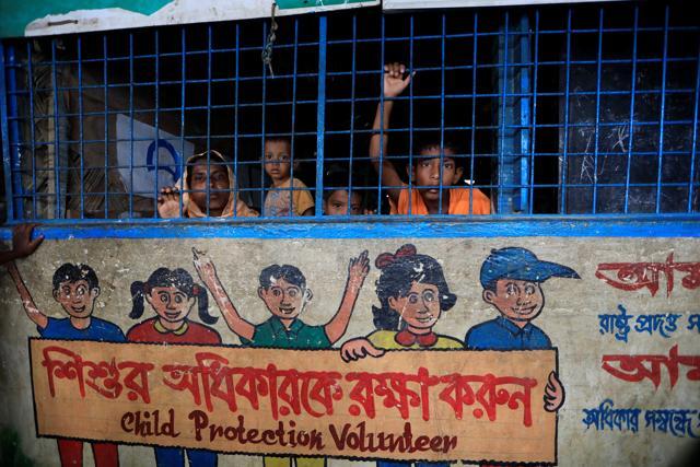 Rohingya refugees who crossed the border from Myanmar this week take shelter at a school in Kotupalang refugee camp near Cox's Bazar. (REUTERS) Rohingya refugees who crossed the border from Myanmar this week take shelter at a school in Kotupalang refugee camp near Cox's Bazar. (REUTERS)
