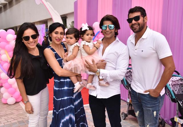 Karanvir poses with his kids and guests at the birthday party.