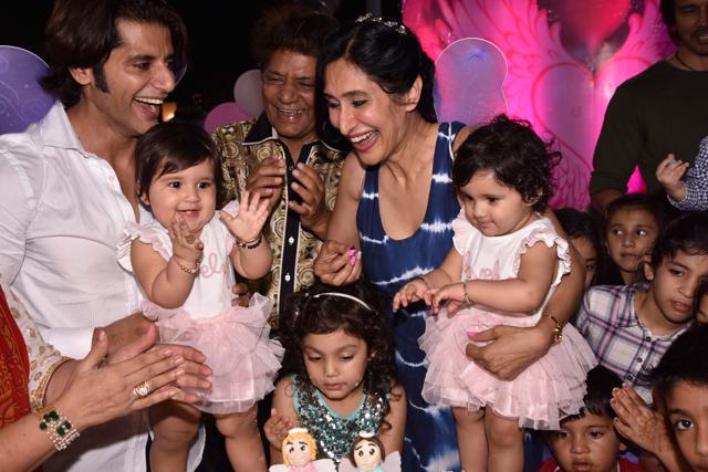 Karanvir and Teejay with their children.