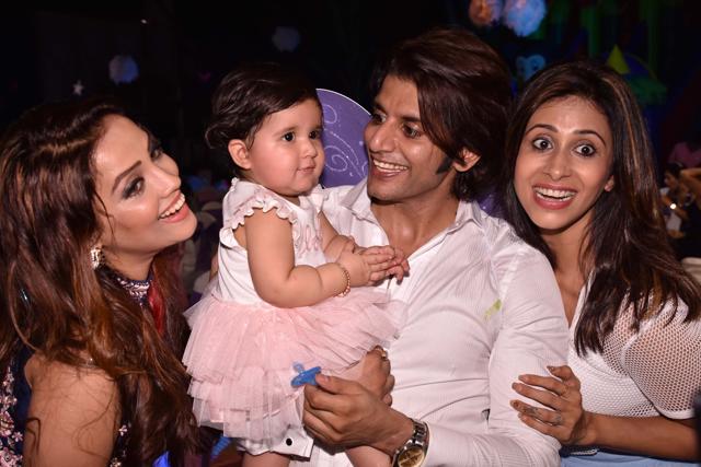 Karanvir can't keep his eyes off his daughter.