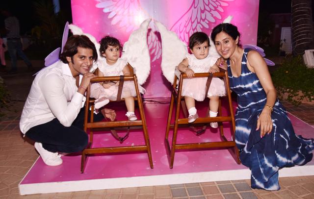 The happy family poses for the camera.