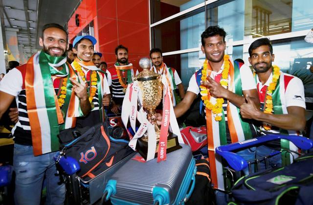 Indian hockey team players on their arrival at IGI Airport in New Delhi on Monday, after winning the Asia Cup 2017 in Dhaka. (PTI)