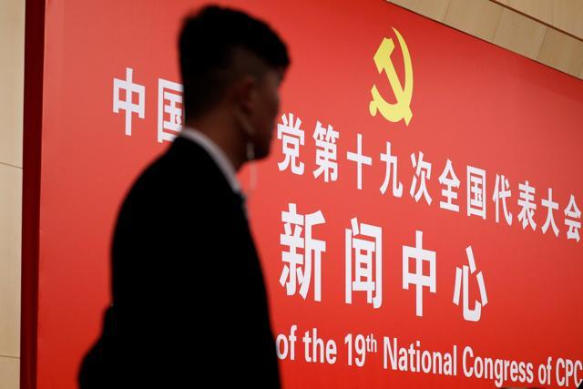 A security guard is seen during a news conference at the National Congress of the Communist Party of China in Beijing on October 23, 2017. (Reuters) A security guard is seen during a news conference at the National Congress of the Communist Party of China in Beijing on October 23, 2017. (Reuters)
