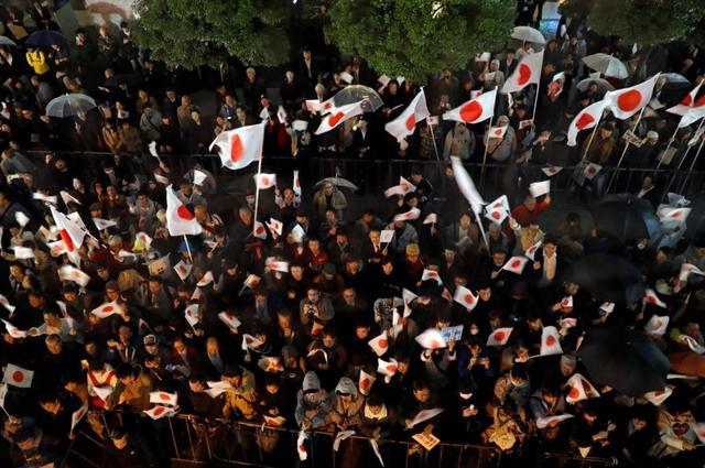 Supporters of the Liberal Democratic Party wait for the arrival of Japan's Prime Minister Shinzo Abe, leader of the party, at an election campaign rally in Tokyo. (Reuters)