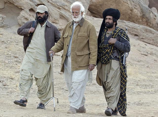Nawab Akbar Bugti (C) walking with his bodyguards on 24 January 2006 in the remote mountainous area of Dera Bugti in Pakistan's Baluchistan province. Pakistani security forces killed Bugti in a major military operation on 26 August, 2006. (Banaras Khan/AFP) Nawab Akbar Bugti (C) walking with his bodyguards on 24 January 2006 in the remote mountainous area of Dera Bugti in Pakistan's Baluchistan province. Pakistani security forces killed Bugti in a major military operation on 26 August, 2006. (Banaras Khan/AFP)