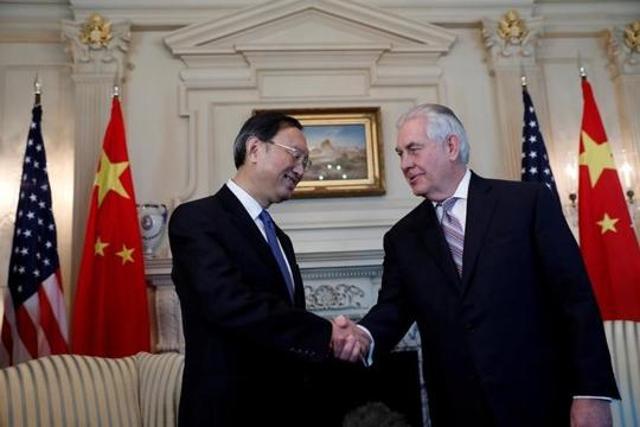 File photo of US secretary of state Rex Tillerson greeting Chinese state councillor Yang Jiechi at the state department in Washington on February 28, 2017. (Reuters)