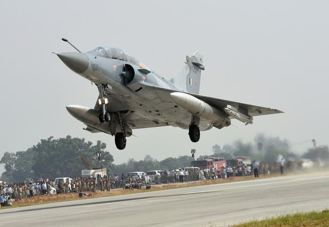 An Indian Air Force Mirage 2000 fighter jet lands on the Lucknow-Agra Expressway. (PTI Photo) An Indian Air Force Mirage 2000 fighter jet lands on the Lucknow-Agra Expressway. (PTI Photo)