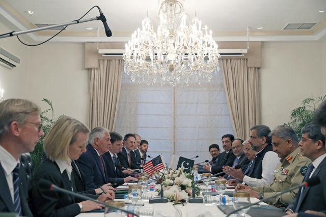 US secretary of state Rex Tillerson sits across from Pakistan Prime Minister Shahid Khan Abbasi during their meeting with delegations at the Prime Minister's House in Islamabad on October 24, 2017. (AP) US secretary of state Rex Tillerson sits across from Pakistan Prime Minister Shahid Khan Abbasi during their meeting with delegations at the Prime Minister's House in Islamabad on October 24, 2017. (AP)