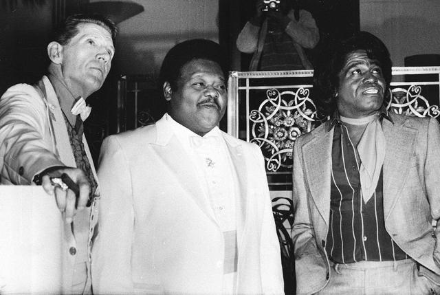 This January 23, 1986 file photo, from left, musicians Jerry Lee Lewis, Fats Domino and James Brown pose at a reception where they were inducted into the Rock and Roll Hall of Fame at the Waldorf-Astoria Hotel in New York. (AP) This January 23, 1986 file photo, from left, musicians Jerry Lee Lewis, Fats Domino and James Brown pose at a reception where they were inducted into the Rock and Roll Hall of Fame at the Waldorf-Astoria Hotel in New York. (AP)
