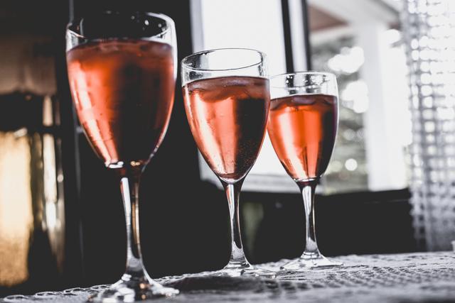 A small glass of wine as many as half a burger. (Shutterstock) A small glass of wine as many as half a burger. (Shutterstock)