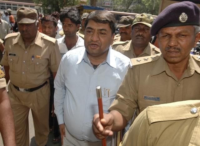 Abdul Karim Telgi (centre) is produced in a court in Ahmadabad in March 2009. (AP file photo) Abdul Karim Telgi (centre) is produced in a court in Ahmadabad in March 2009. (AP file photo)