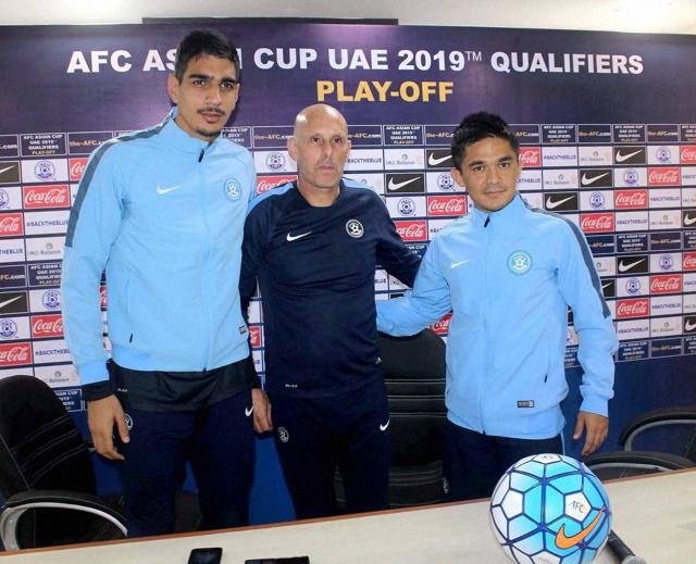 Indian Football team players Sunil Chhetri and Gurpreet Singh Sandhu with coach Stephen Constantine at a press conference in Guwahati. (PTI)
