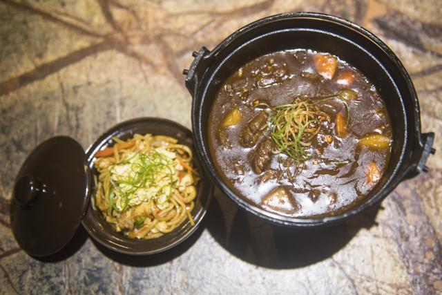 We paired a small but scrumptious portion of stir-fried Udon noodles with the tenderest braised lamb we’ve had in a while. (Pratik Chorge / HT Photo)